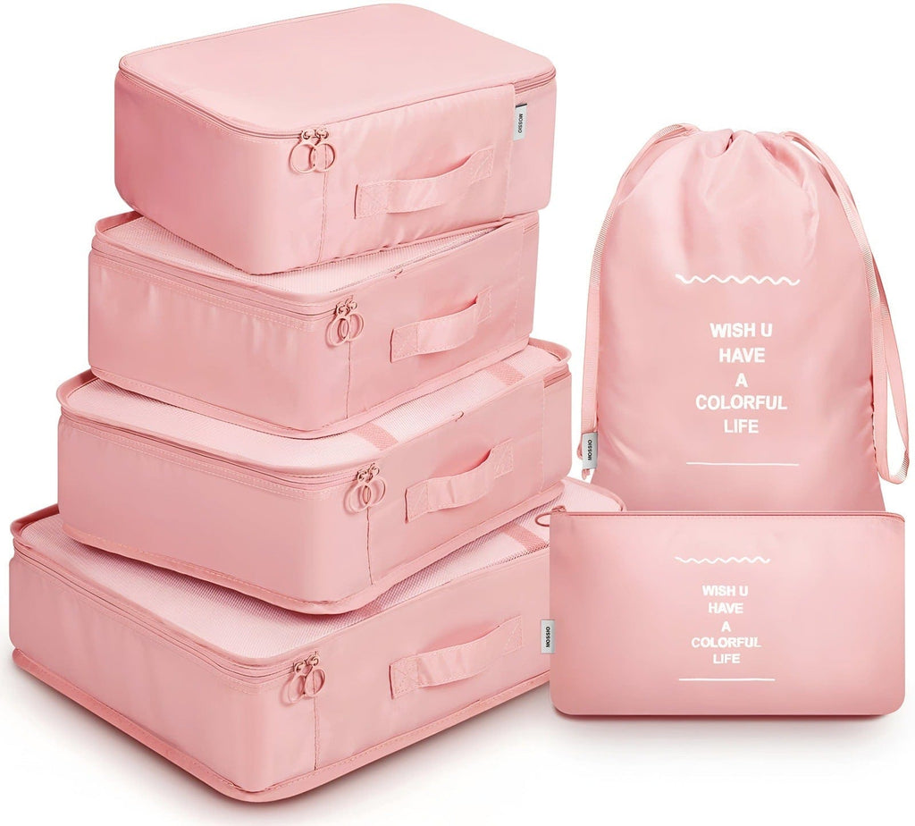 Light pink 6 piece set of luggage storage bags.