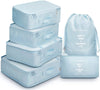 Light blue 6 piece set of luggage storage bags.