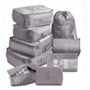 Gray 9 piece set of luggage storage bags.