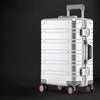 Silver rolling aluminum luggage.