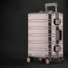 Titanium rolling aluminum luggage suitcase.