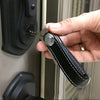 Black leather compact key holder.