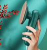 Compact Portable Steam Iron in the color teal.